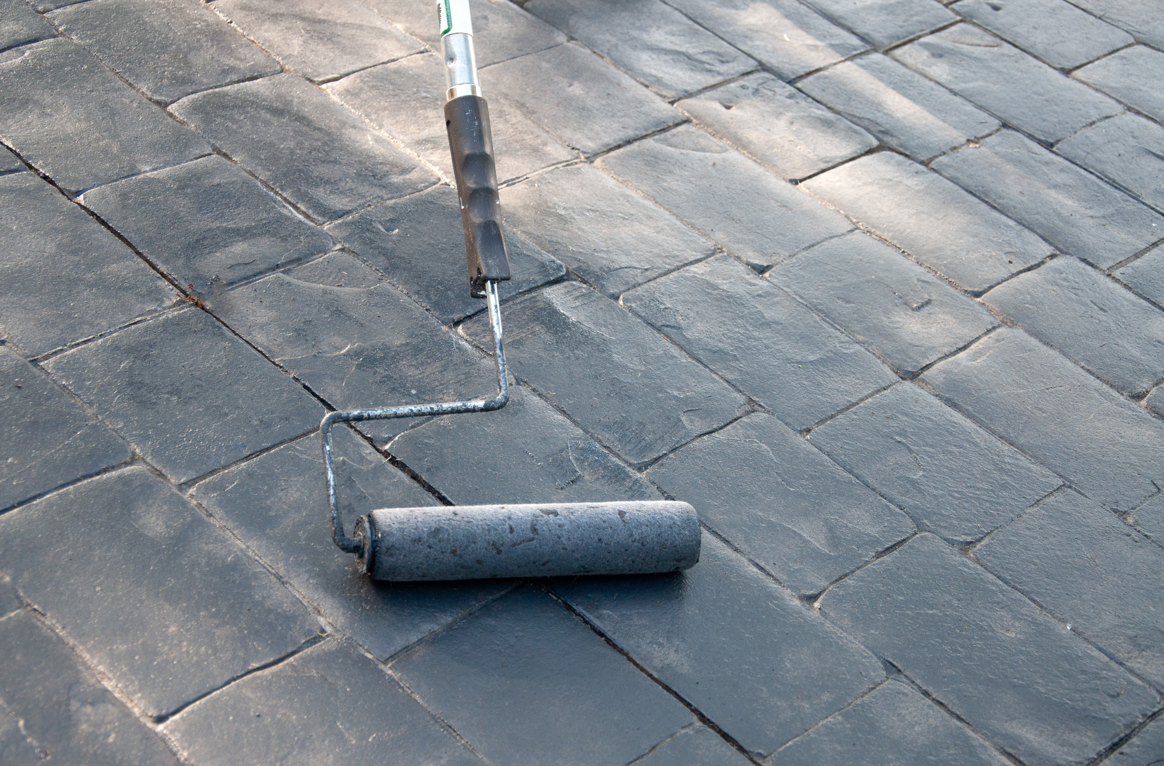High-performance interlocking paver sealing